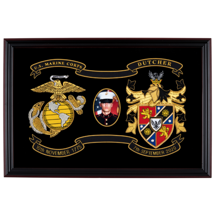 Legacy on Display – US Marine Corps: Hand-stitched display featuring military insignia, family coat of arms, and a personal photo in a cherry wood shadow box