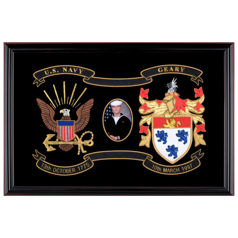 My Lineage Legacy on Display – US Navy: Hand-stitched display featuring military insignia, family coat of arms, and personal photo in a cherry wood shadow box.